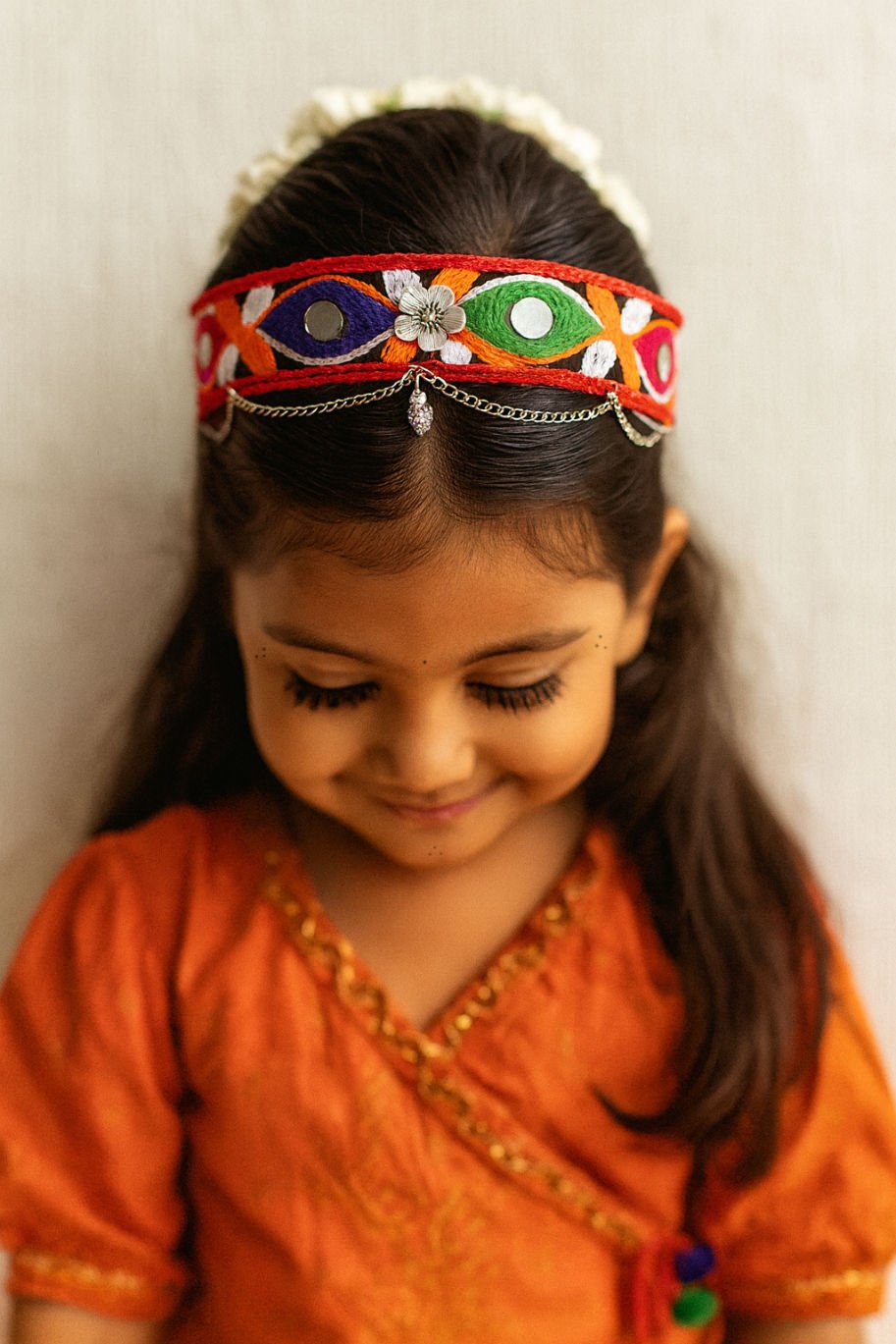 Red Mirror Work Festive Glam Girls Ethnic Hairband With Silver Floral Charm