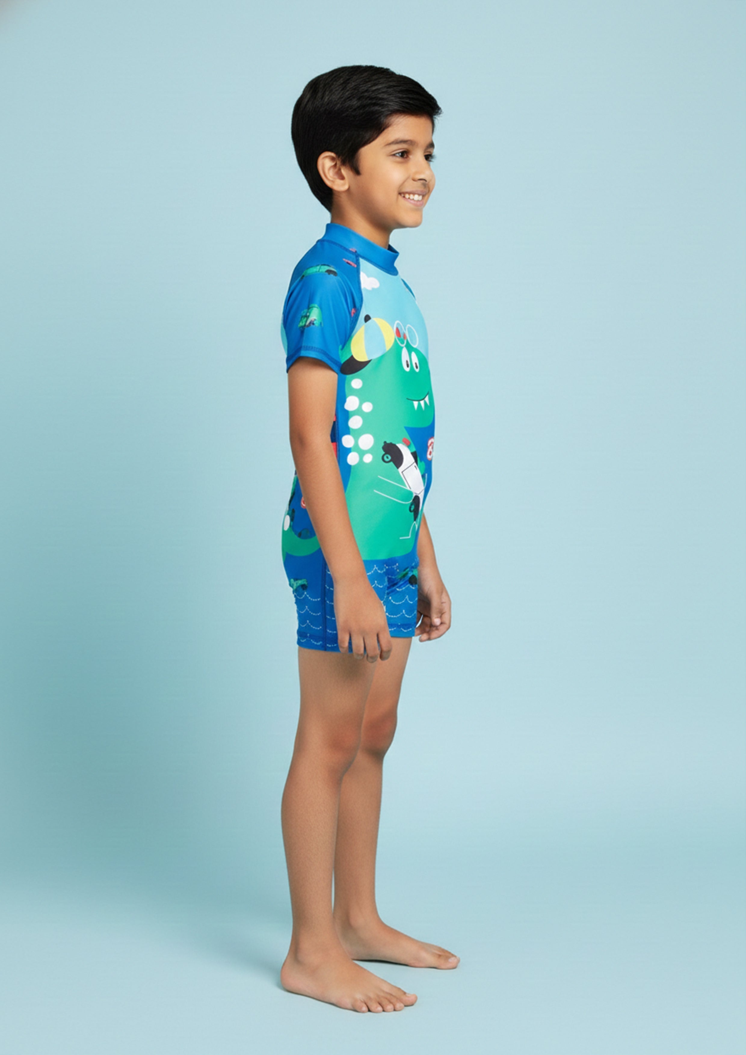 Blue Printed Dino Dive Boys Swimsuit With Matching Cap